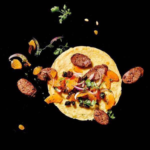 Gluten-Free Chickpea Crepes with Sautéed Lamb Sausage and Orange-Olive Relish