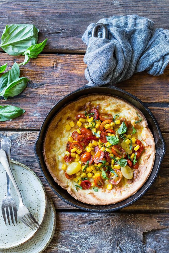 Gluten-Free Cheddar and Corn-Flour Dutch Baby with Roasted Sweet Corn and Cherry Tomatoes