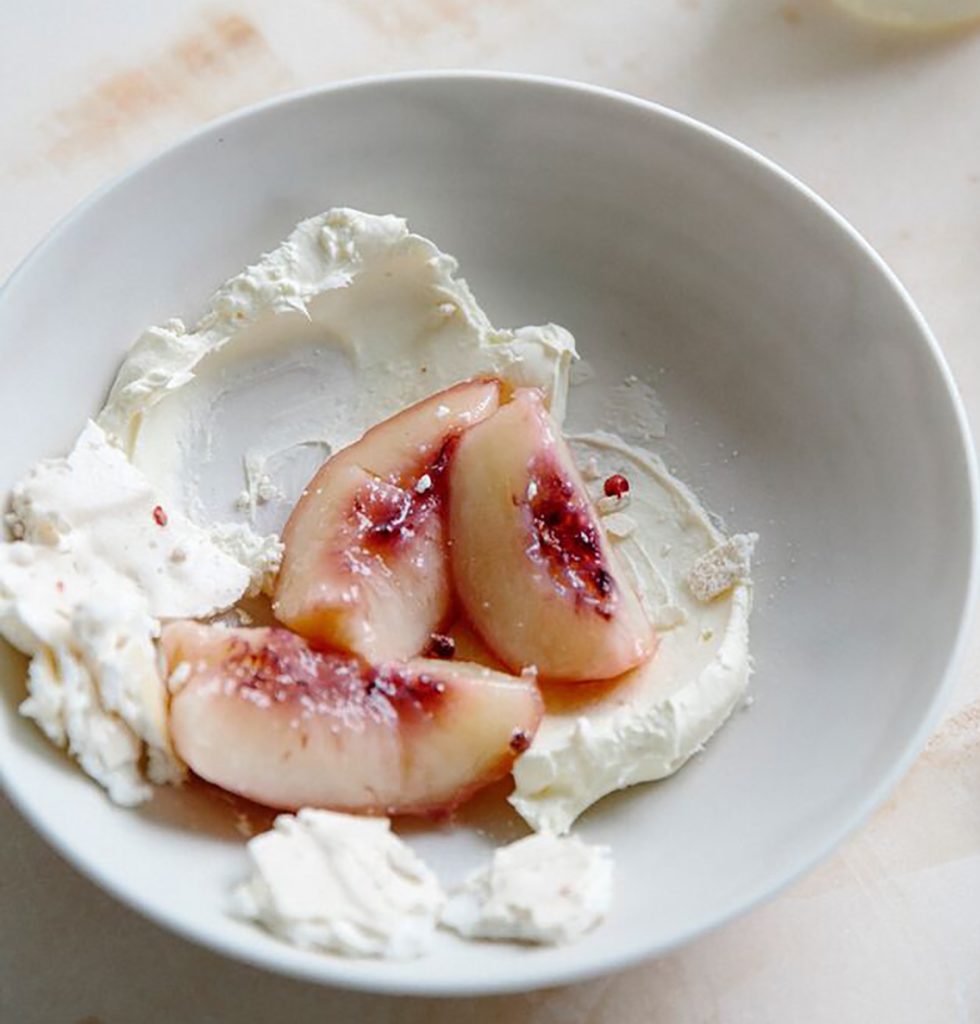 Hibiscus-Poached White Peaches with Pink Peppercorn and Vanilla Salt Meringue Recipe