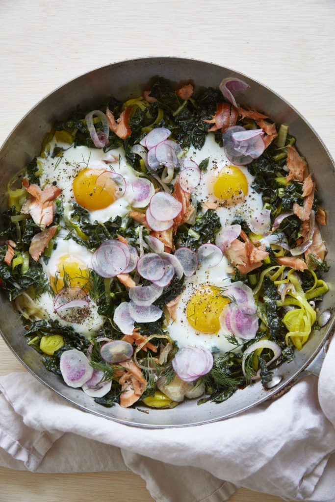 Baked Eggs with Caramelized Onion, Kale, and Smoked Salmon